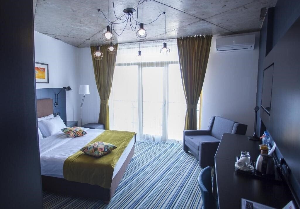 Фото Tangerine Apart Hotel 4*