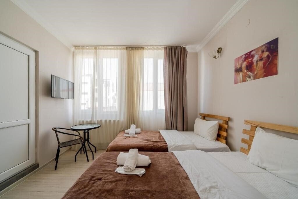 Tato Hotel 3* суреті