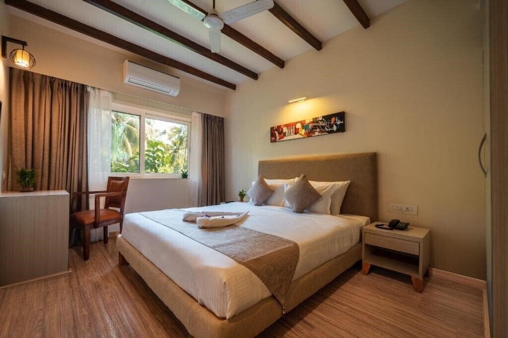 Фото Evoke Premium Candolim 4*