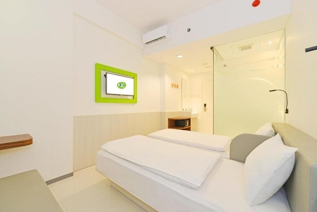 Pop Hotel Pasar Baru 3* суреті