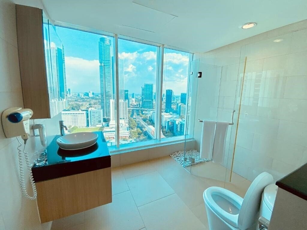 Фото Habitare Rasuna Jakarta 4*