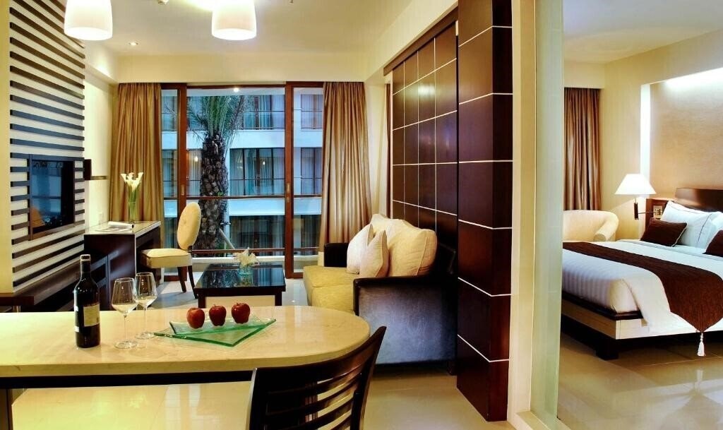 Фото Aston Kuta Hotel - Residence 4*