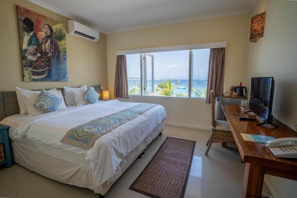 Фотография Scallywags Resort Gili Trawangan 4*