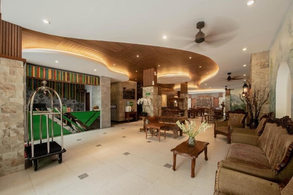 Sandat Kuta Hotel 3* суреті