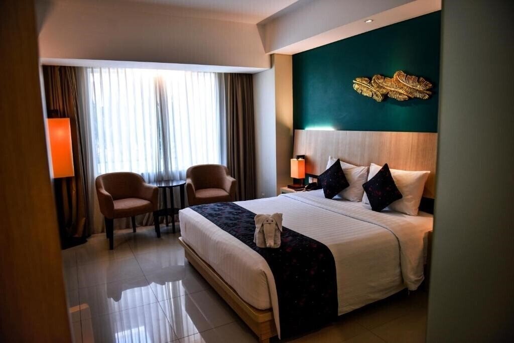 Фото The Kana Kuta Hotel 4*