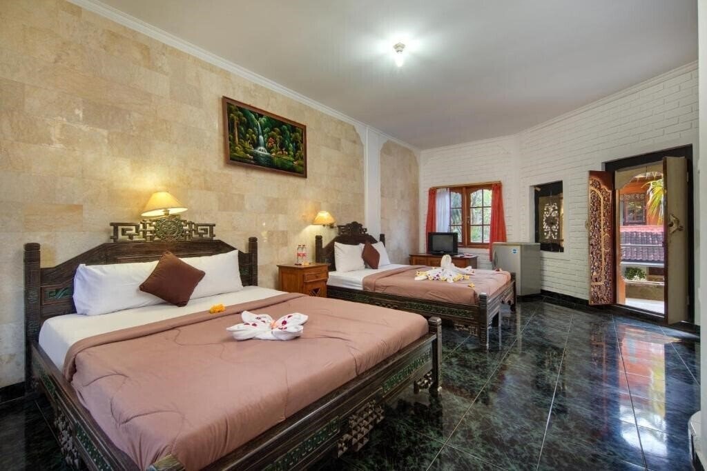 Фото Hotel Lumbung Sari Legian 4*