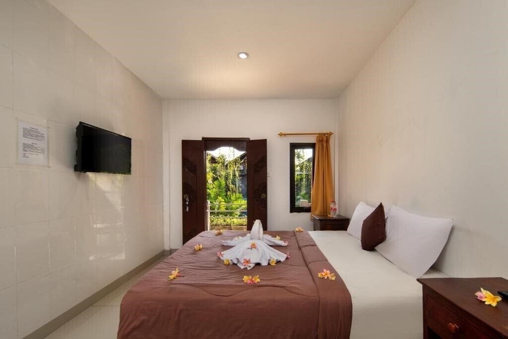 Hotel Lumbung Sari Legian 4* суреті
