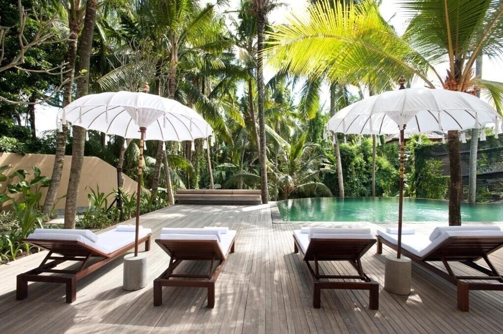 Komaneka at Rasa Sayang 4* суреті