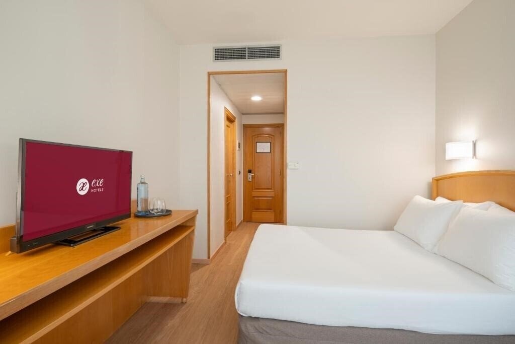 Hotel Exe Area Central 3* суреті