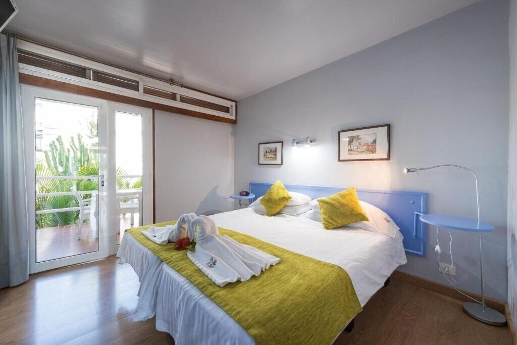 Фото Apartamentos El Paseo 3*