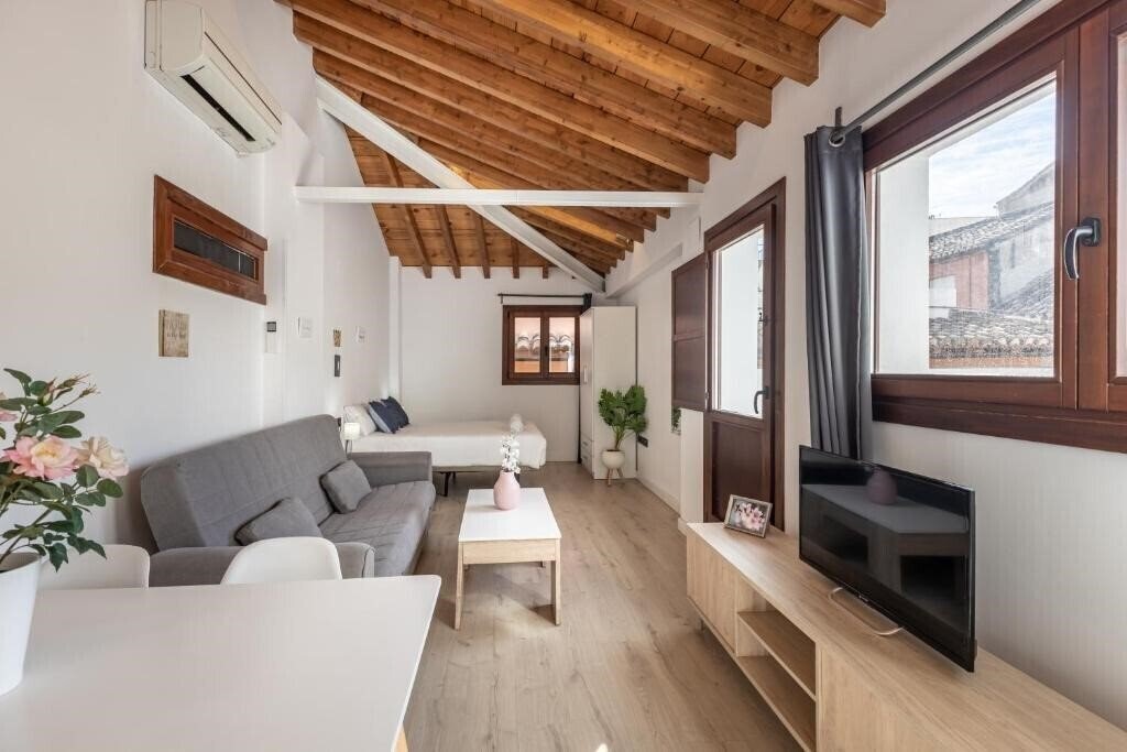 Отель Apartamentos Granada Deluxe 3000 3*