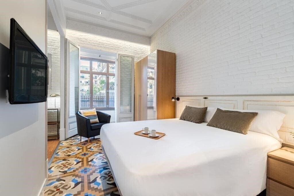 Фото Fuster Apartments 4*