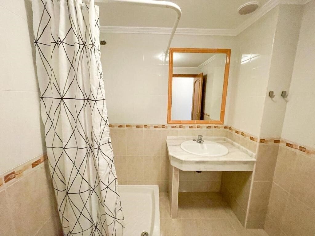 Фотография Apartamentos Playa De La Lanzada 3000 3*