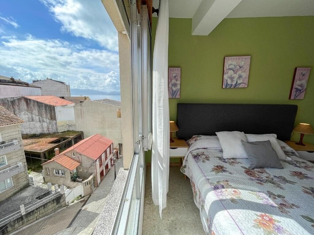 Фото Apartamentos Portonovo Playa 3000 3*