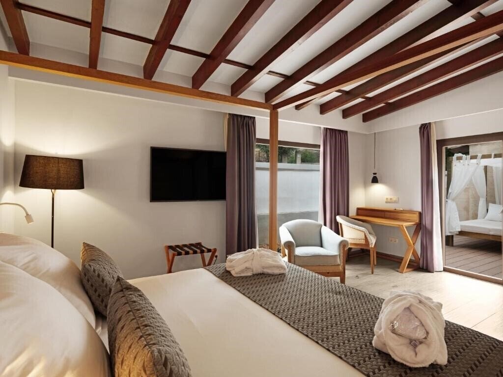 Фотография Tacande Portals 4*