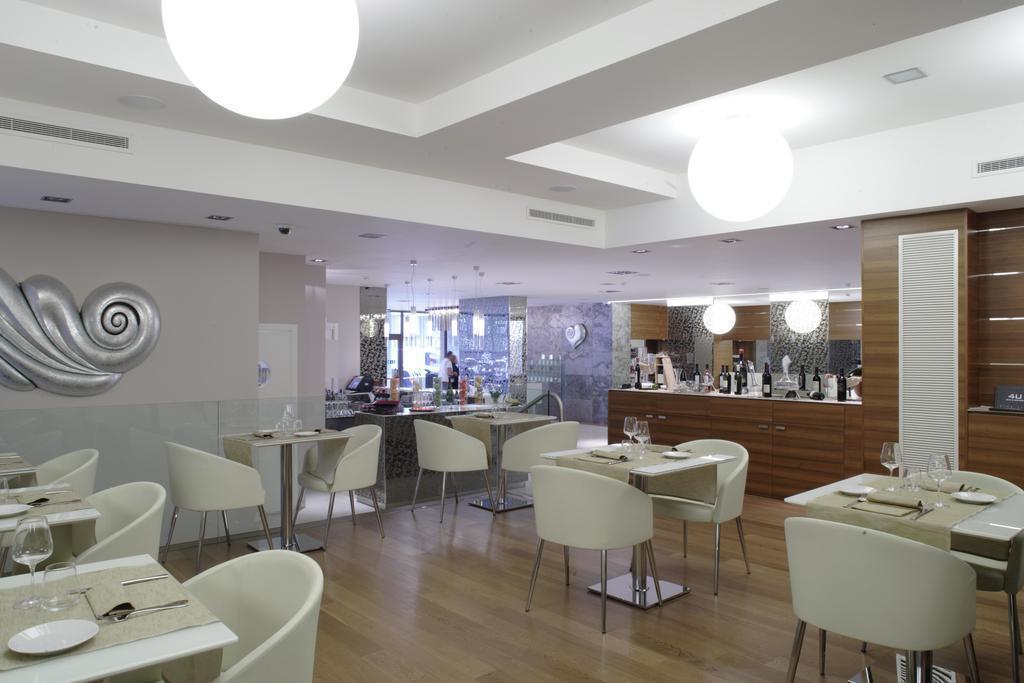 4 Viale Masini Design Hotel 4* фотосуреті