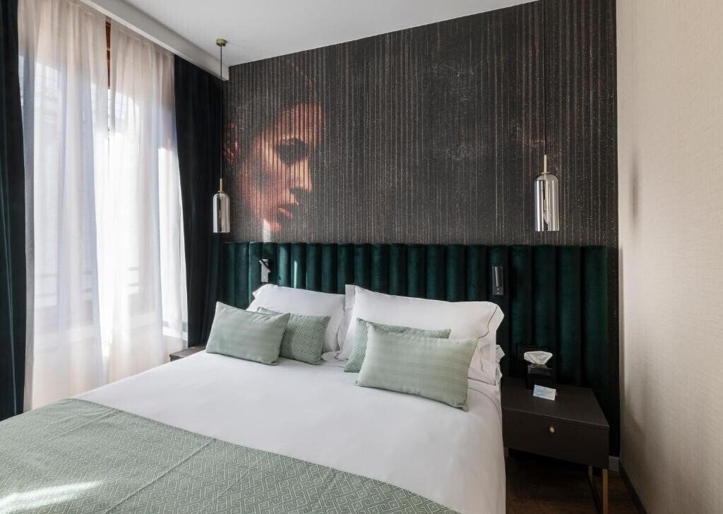 Отель Duomo Apartments Milano 4*