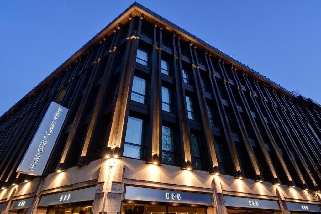 Отель Una Hotel Cusani 4*