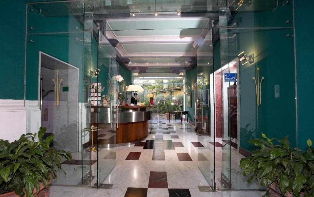 Отель Ateneo Garden Palace 4*