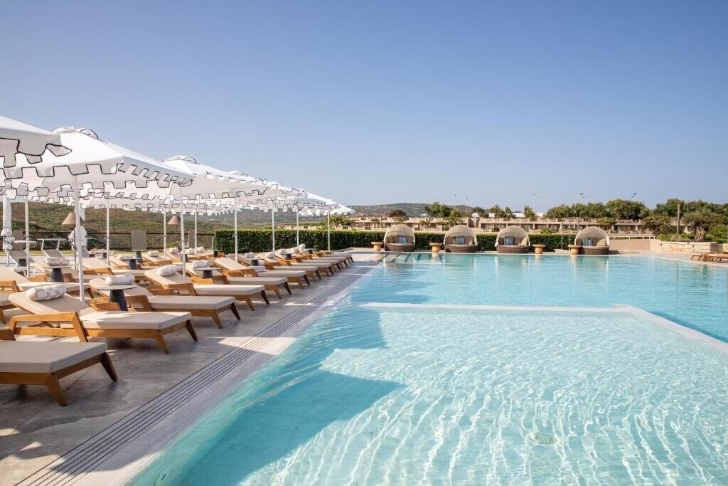 Фотография Mangia's Sardinia Resort (ex. Marmorata Village, MClub Marmorata) 4*