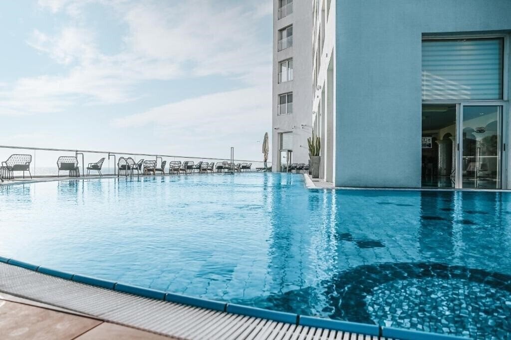 Dan Hotel 5* суреті