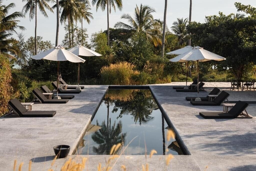 Tamu Hotel 4* суреті