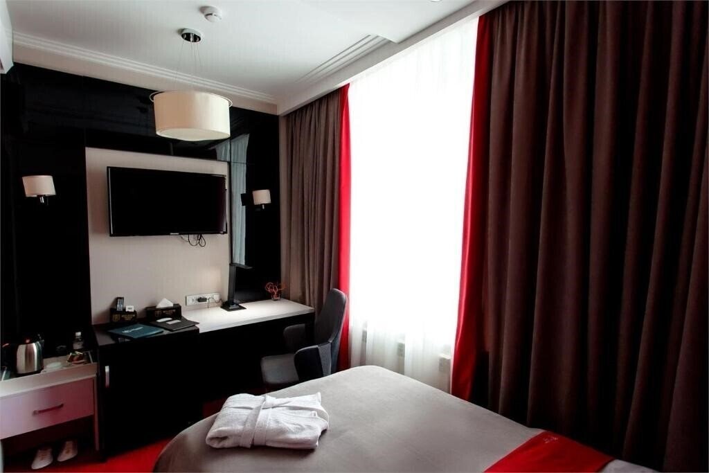 Изображение Mildom Premium Hotel 3*