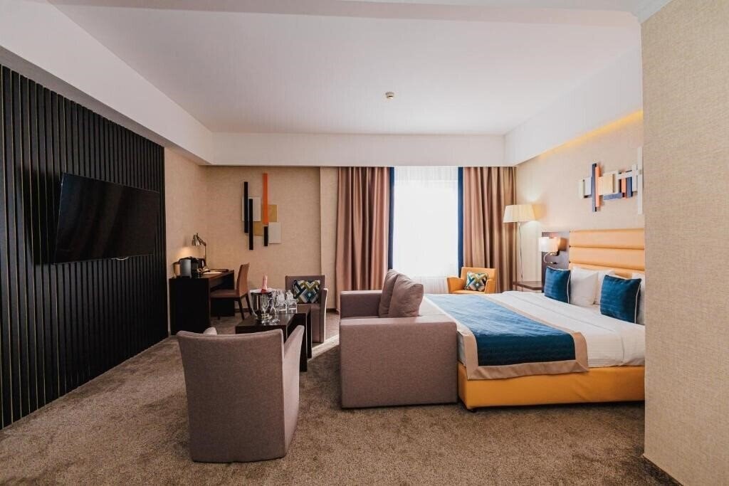 Фото Comfort Hotel Astana 4*