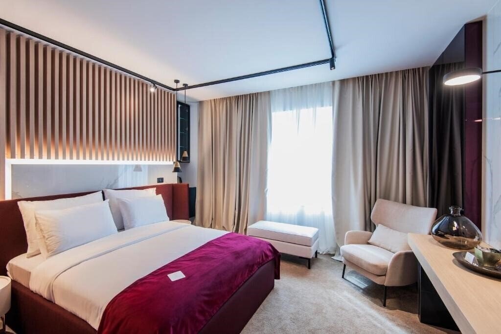 Pod Zidom Rooms 4* суреті