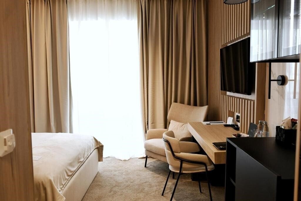 Pod Zidom Rooms 4* суреті