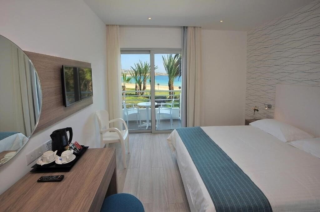 Фото Okeanos Beach Boutique Hotel 3*