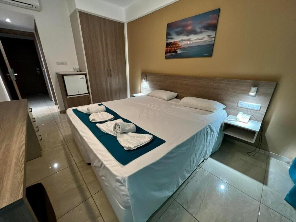 Фото Sunny Blue Hotel 4*