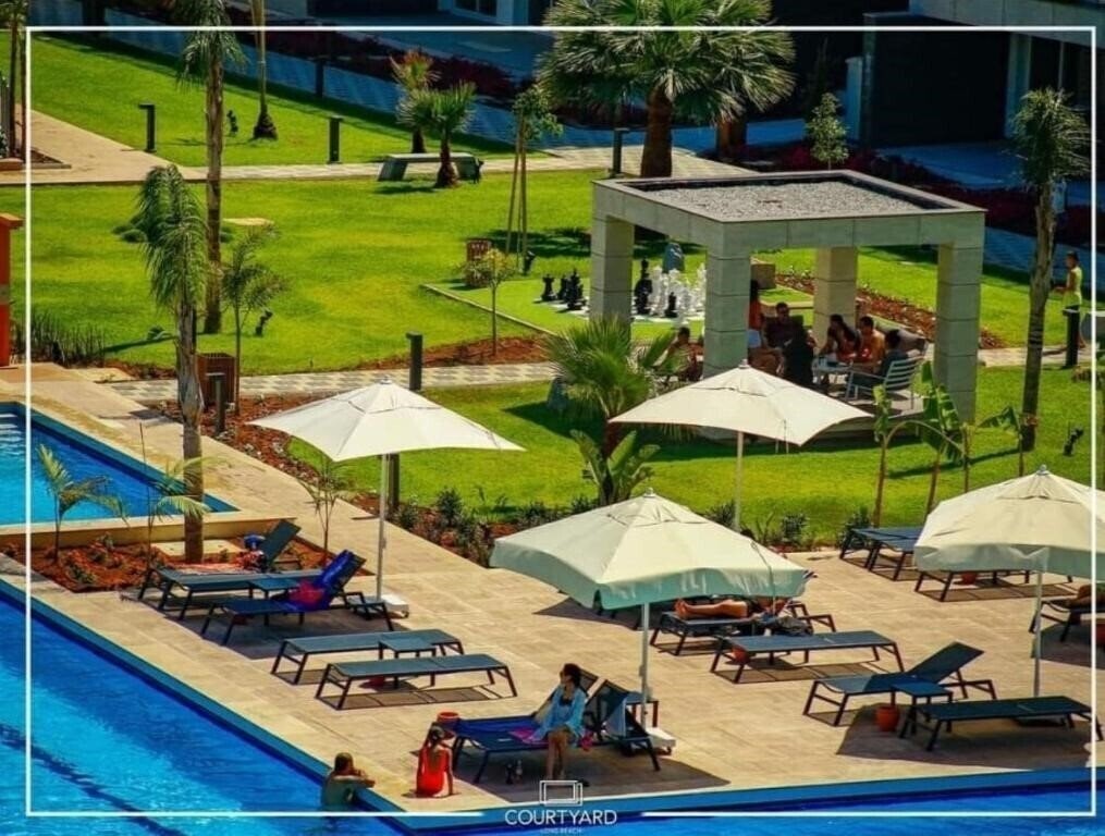 Courtyard Long Beach Holiday Resort 5* фотосуреті