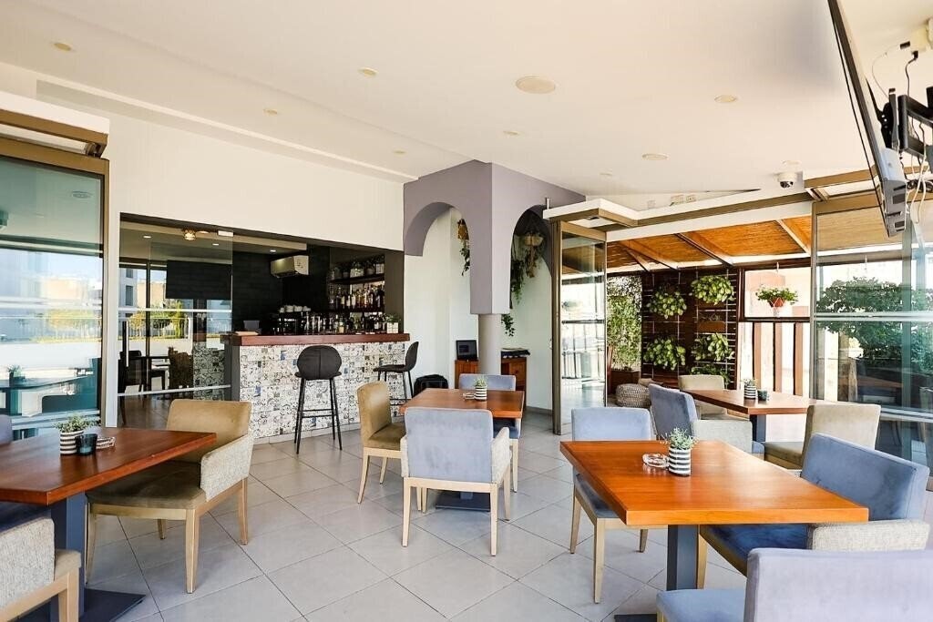 Mikes Kanarium City Hotel 3* суреті