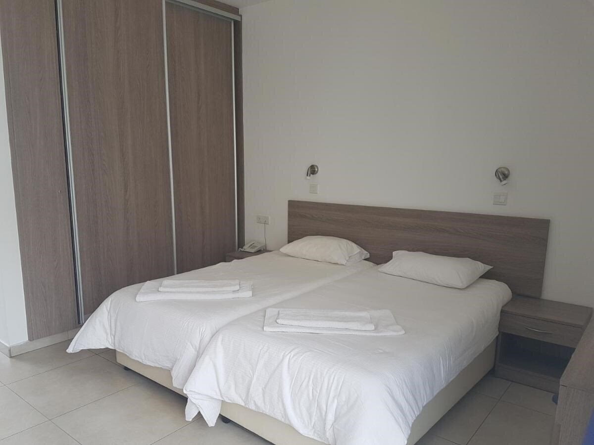 Фотография Cosmelenia Hotel Apartments 3*