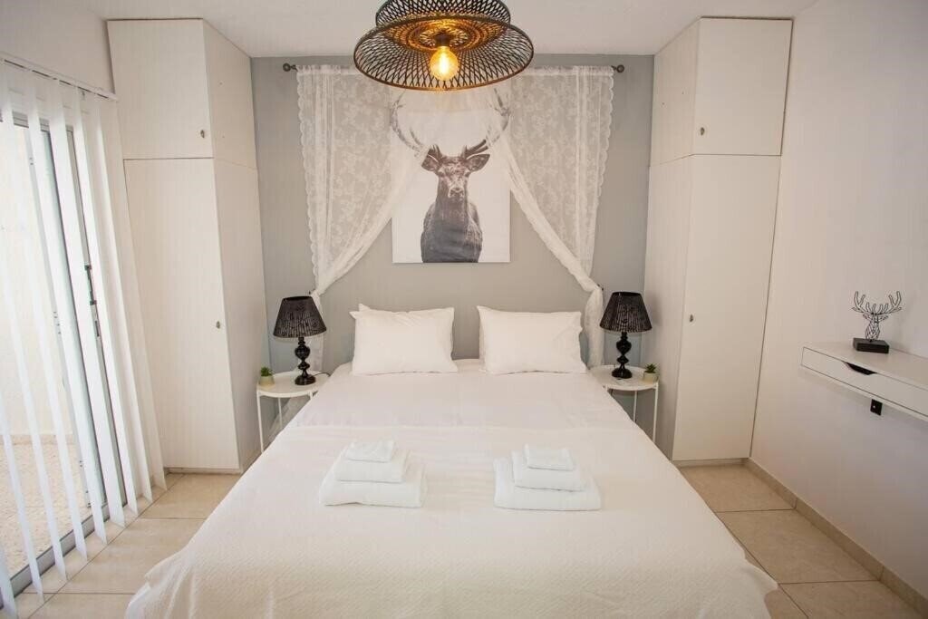 Фотография Estea - Rheas Cozy 1 Bedroom Apartment 3*