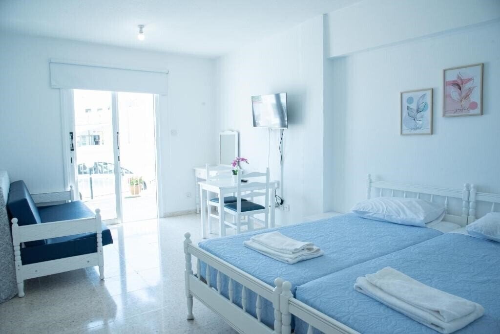 Фото Flisvos Beach Apartments 2*