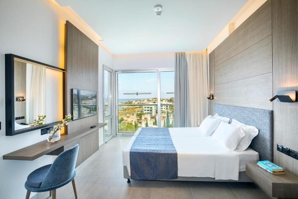 Фотография Cavo Maris Beach Hotel 4*