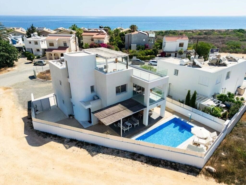 Фото Geo Panoramic Villa Konnos - Pool, Game Room, Gym 2*