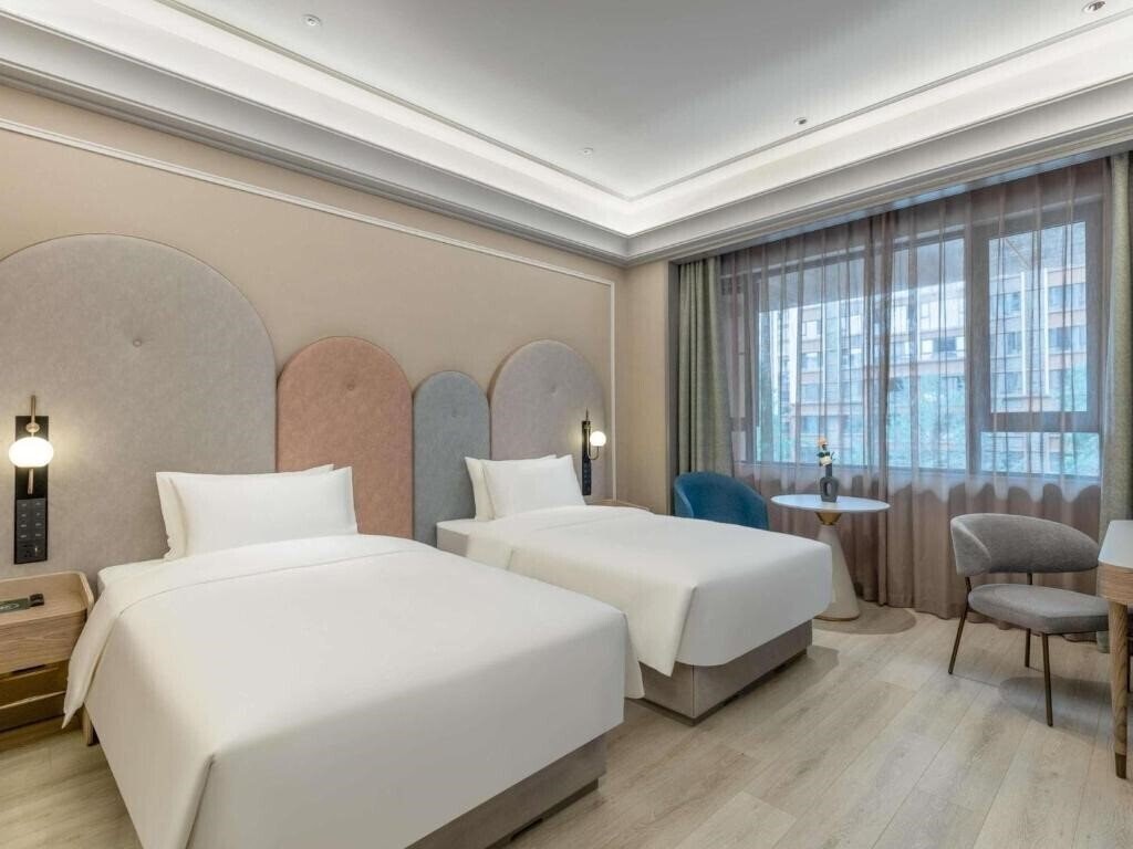 Фото Mercure Chengdu Shuangliu International Airport 4*