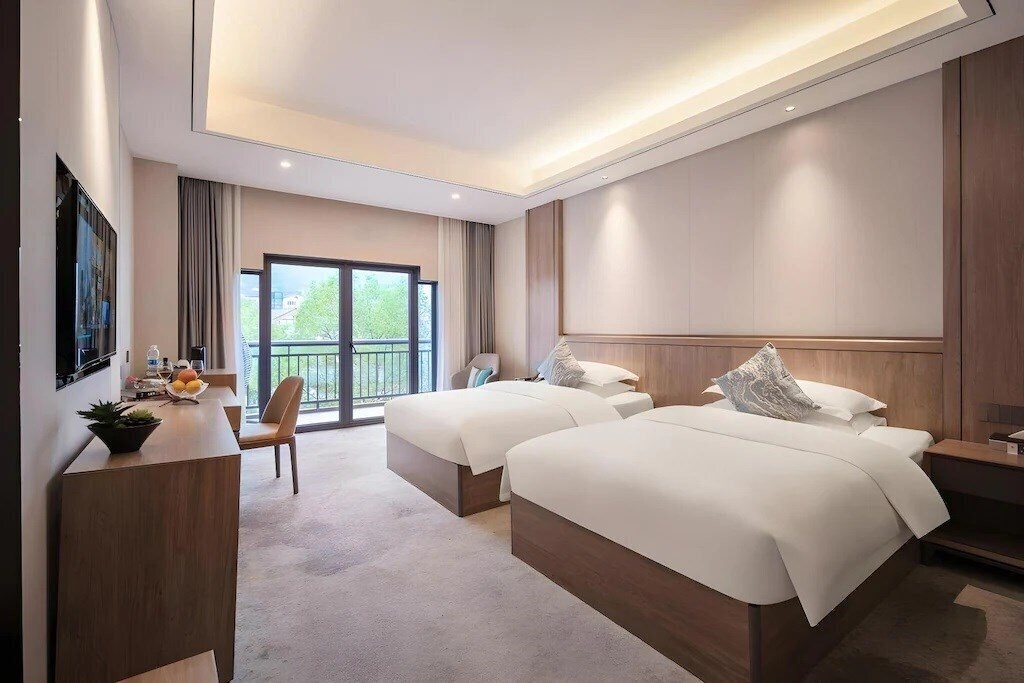Изображение Zhangjiajie Expert Village Yangguang Hotel 4*