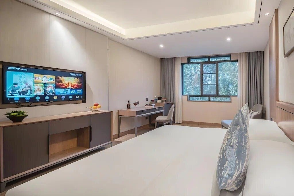 Фотография Zhangjiajie Expert Village Yangguang Hotel 4*