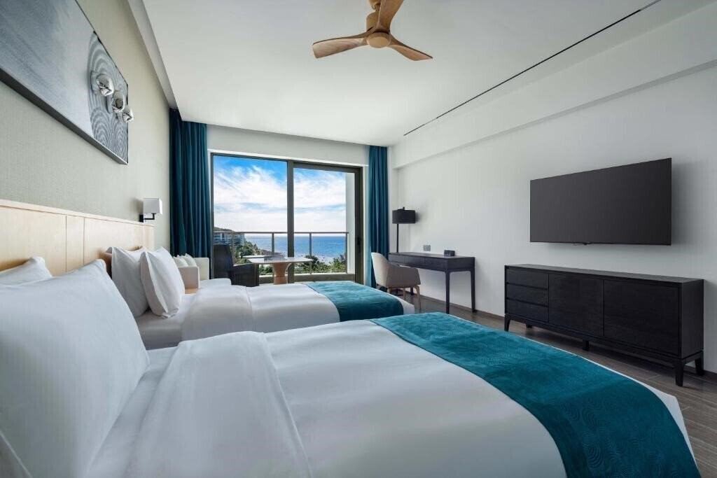 Фото Sanya Junji Seaview Hotel 5*
