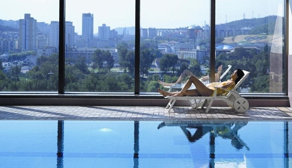Фото Ruishi Hotel Dalian 5*