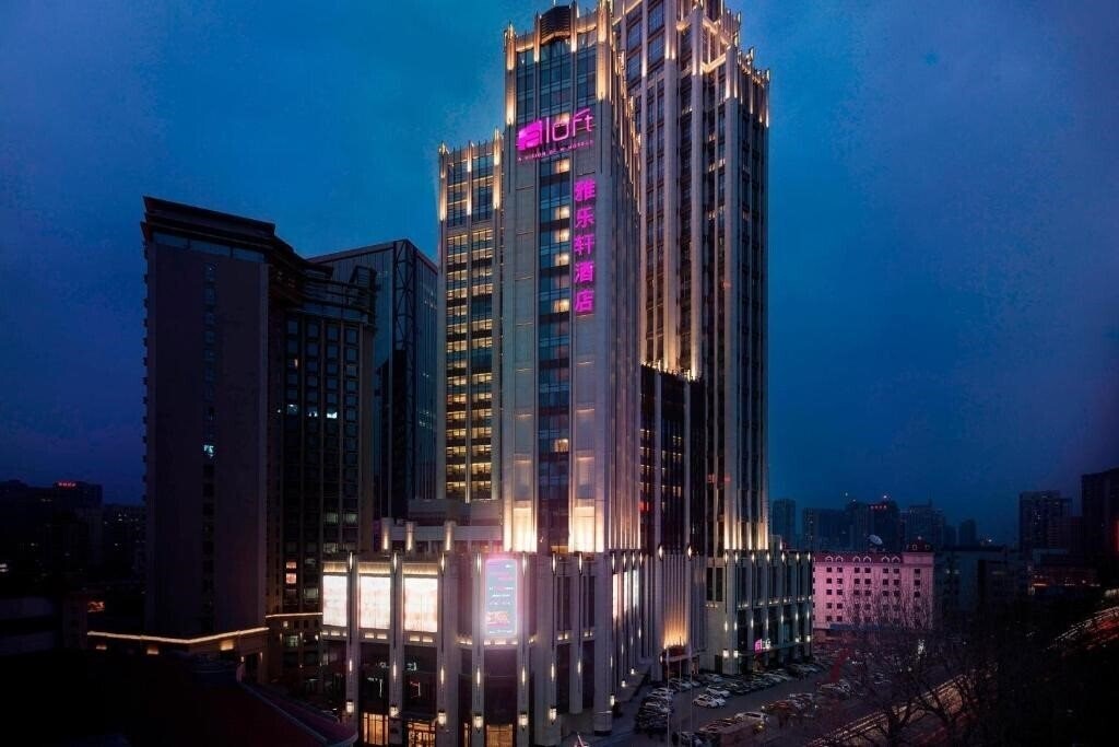 Отель Aloft Dalian 4*