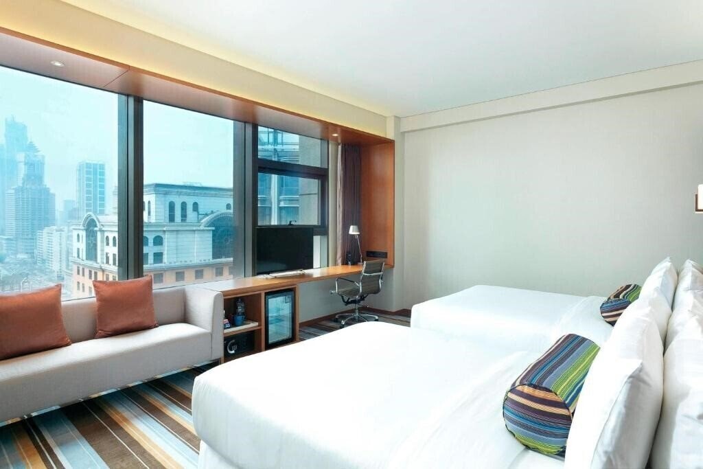 Фото Aloft Dalian 4*