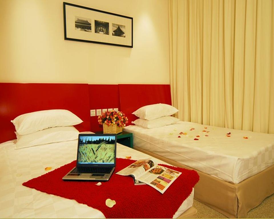 Traveler Inn Huaqiao Beijing 3* суреті