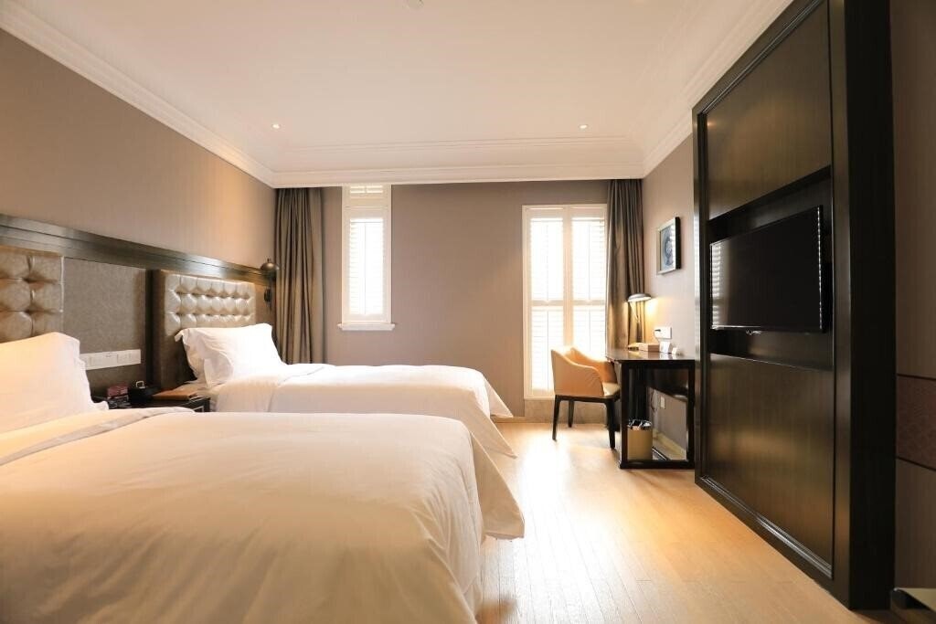 Отель Jinjiang Metropolo Shanghai Nanjing Hotel 4*