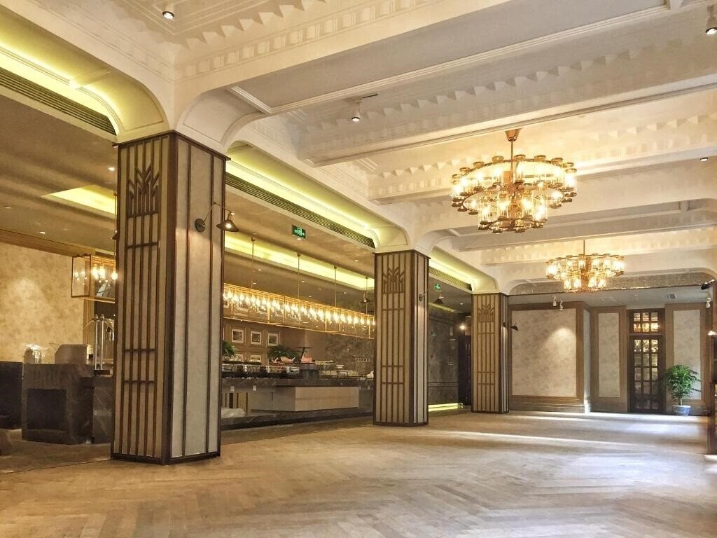Фотография Jinjiang Metropolo Shanghai Nanjing Hotel 4*