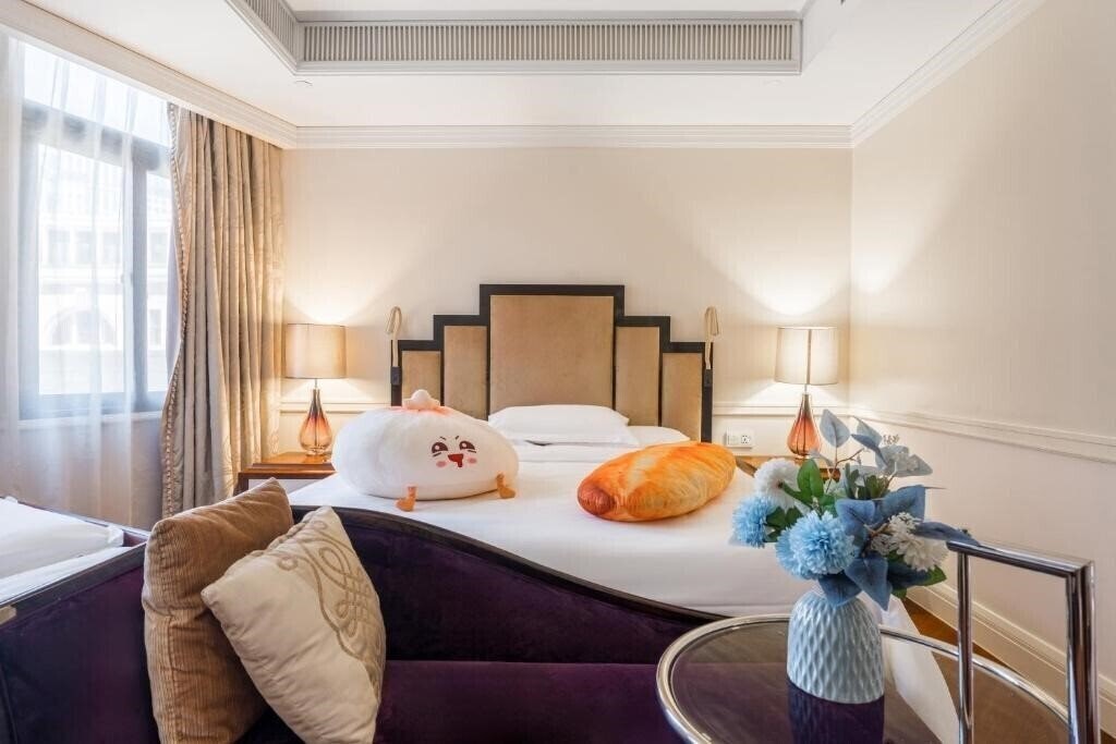 Фото Jinjiang Metropolo Xincheng Hotel, The Bund 4*